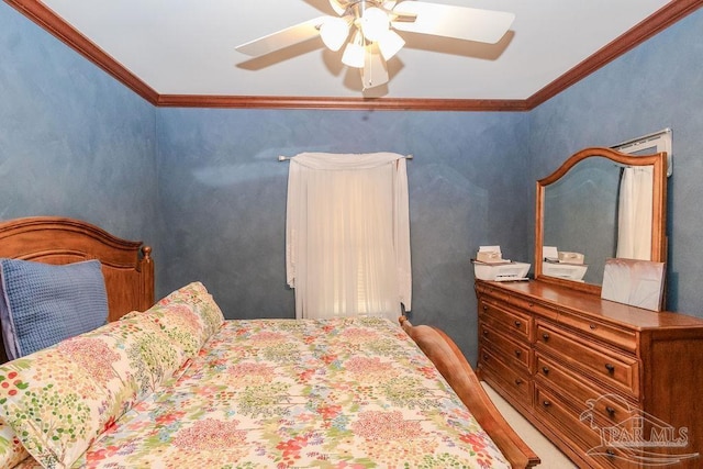 bedroom featuring a ceiling fan and crown molding