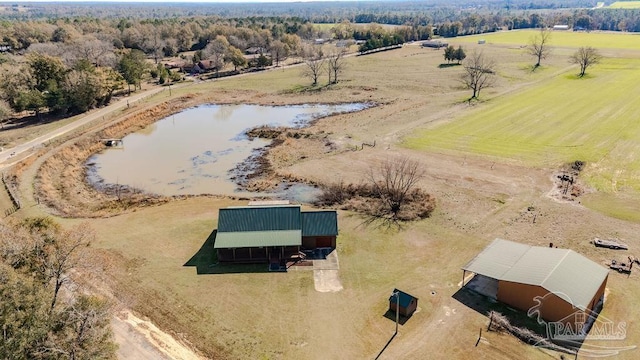 aerial view with a water view and a rural view