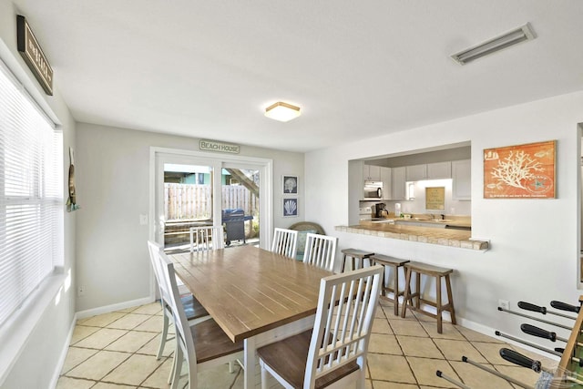 view of tiled dining space