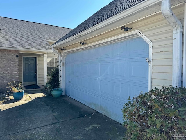 garage with driveway