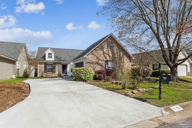 152 Mirabelle Cir, Pensacola, FL 32514 - view of front of house with concrete driveway, brick siding, and a garage