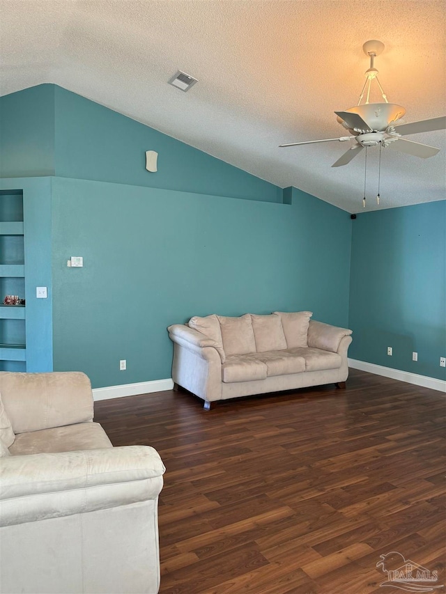 living room with wood finished floors, lofted ceiling, and ceiling fan