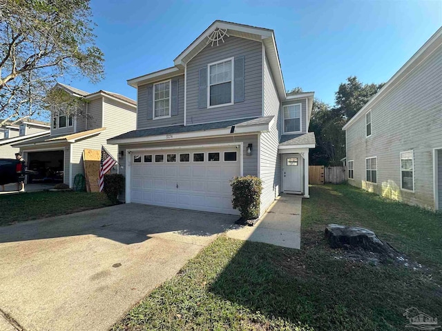 front facade with a front lawn and a garage