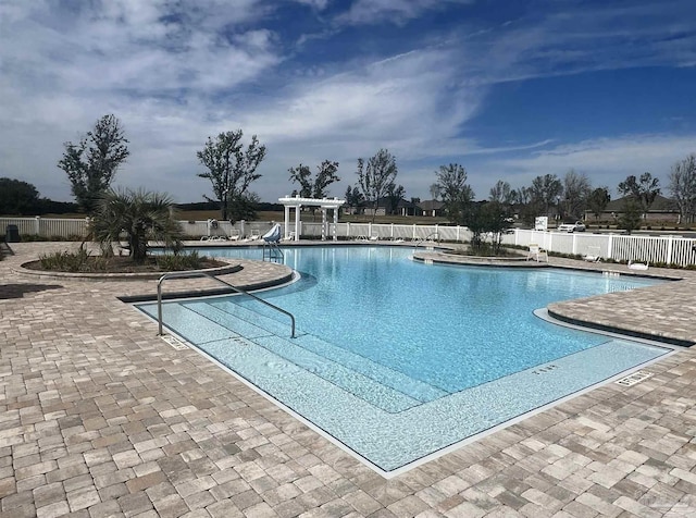 view of pool featuring a patio area