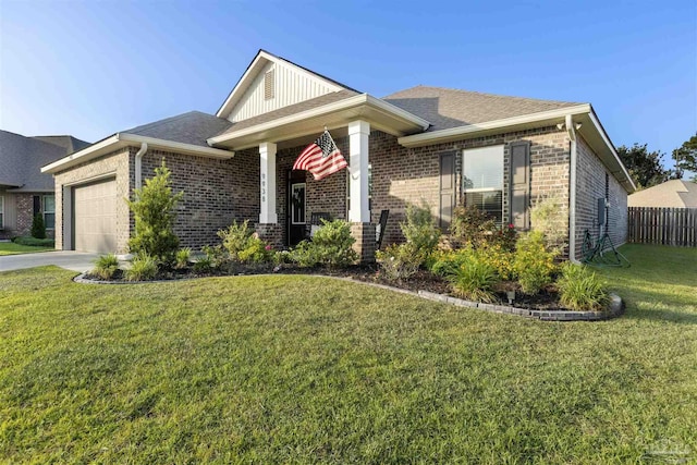 9938 Suwanee Ln, Pensacola, FL 32526 - view of front of house featuring brick siding, an attached garage, concrete driveway, roof with shingles, and board and batten siding