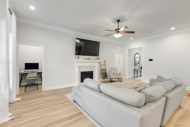 9938 Suwanee Ln, Pensacola, FL 32526 - living room featuring a ceiling fan, light wood finished floors, crown molding, baseboards, and recessed lighting