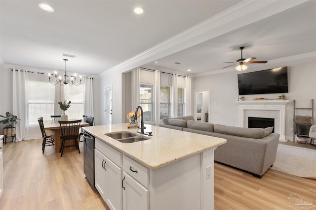 9938 Suwanee Ln, Pensacola, FL 32526 - kitchen with a sink, dishwasher, ornamental molding, light wood finished floors, and a chandelier