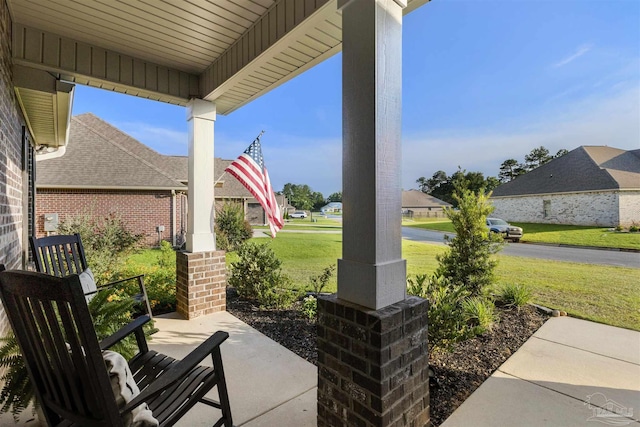 9938 Suwanee Ln, Pensacola, FL 32526 - covered porch featuring a yard