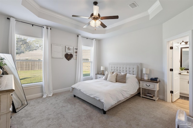 9938 Suwanee Ln, Pensacola, FL 32526 - bedroom featuring a tray ceiling, crown molding, carpet floors, and multiple windows