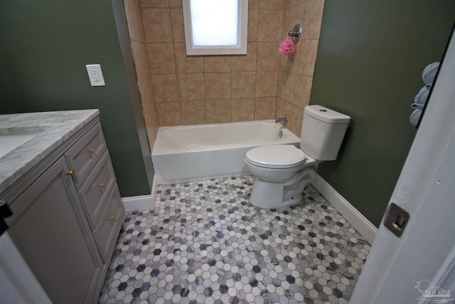 full bathroom with vanity, toilet, and tiled shower / bath