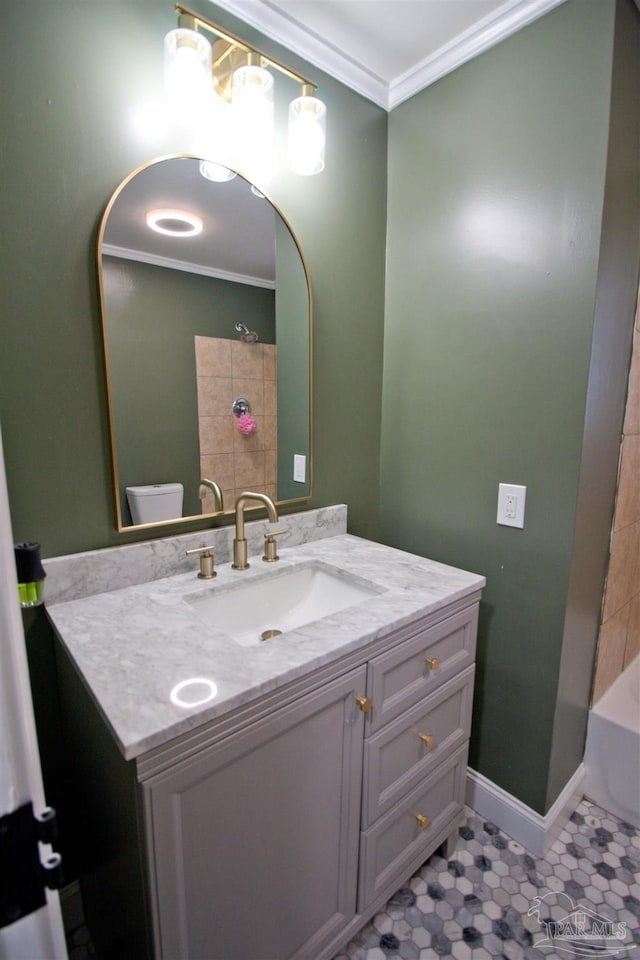 full bathroom with tile patterned floors, toilet,  shower combination, ornamental molding, and vanity