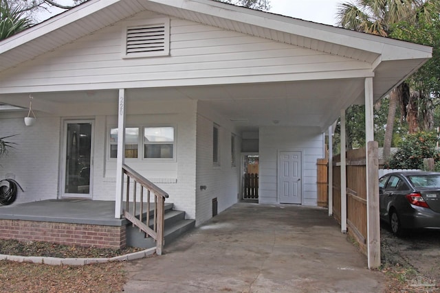 view of front of home with a carport