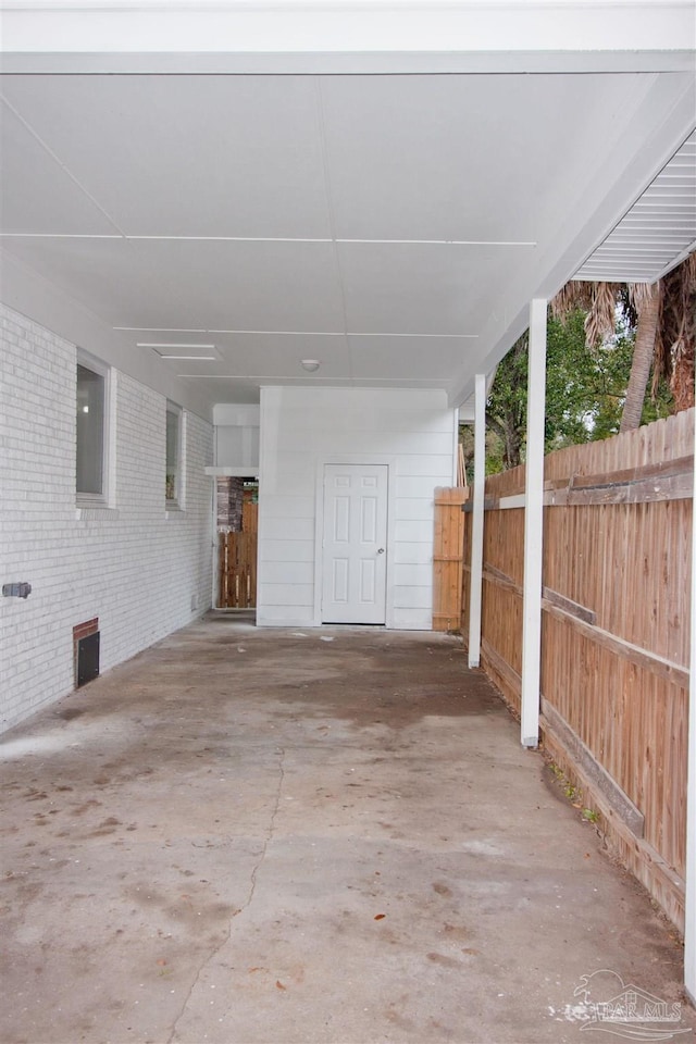 view of patio featuring a carport