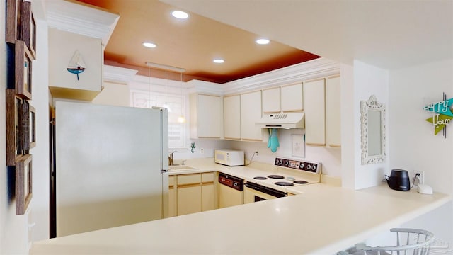 kitchen with under cabinet range hood, light countertops, recessed lighting, and white appliances