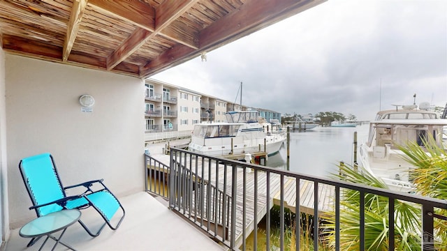 balcony featuring a water view
