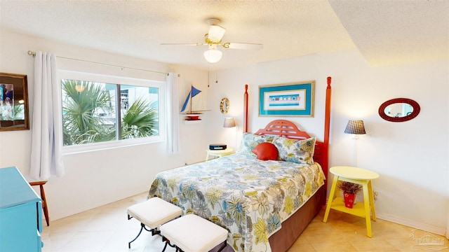 bedroom with baseboards, a textured ceiling, and ceiling fan