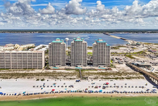 bird's eye view featuring a beach view and a water view