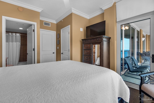bedroom featuring wood finished floors, visible vents, ornamental molding, and access to outside