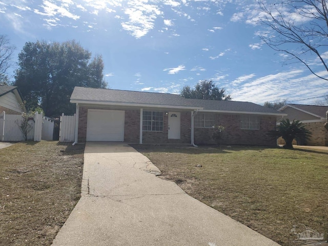 ranch-style house featuring a front lawn and a garage