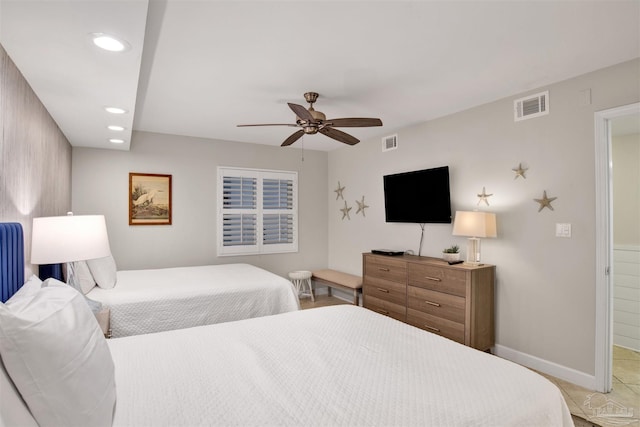 bedroom with light tile patterned floors and ceiling fan