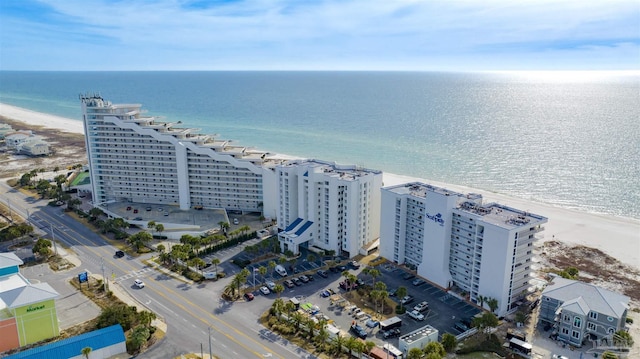 bird's eye view with a view of the beach and a water view