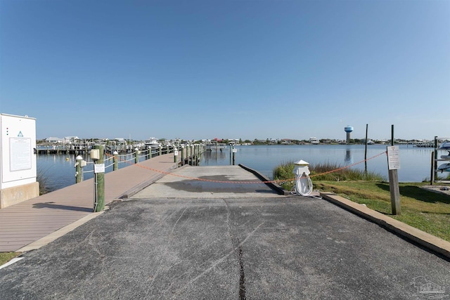 dock area with a water view