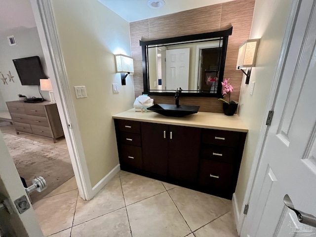 bathroom featuring tile patterned floors and vanity