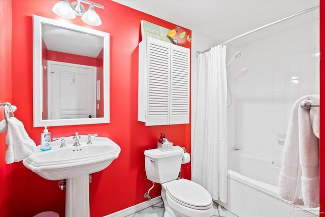 bathroom with toilet and shower / bath combo