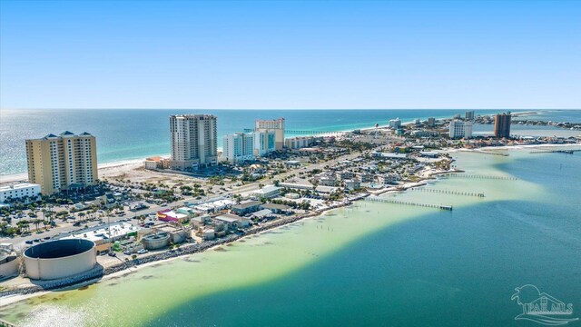 aerial view featuring a water view and a view of the beach