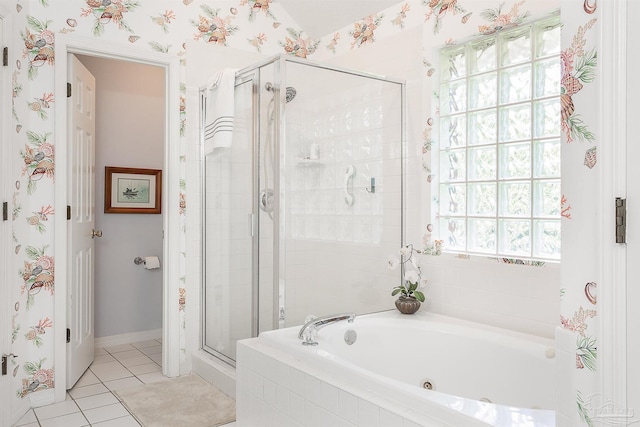 4200 Madura Rd, Gulf Breeze, FL 32563 - bathroom featuring tile patterned floors, a shower stall, and a bath