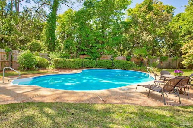 4200 Madura Rd, Gulf Breeze, FL 32563 - view of pool with a fenced backyard, a yard, a fenced in pool, and a patio area