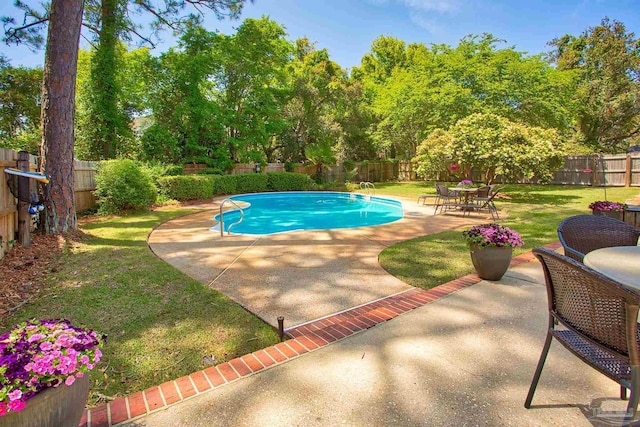 4200 Madura Rd, Gulf Breeze, FL 32563 - view of pool with a patio area, a fenced backyard, a fenced in pool, and a lawn