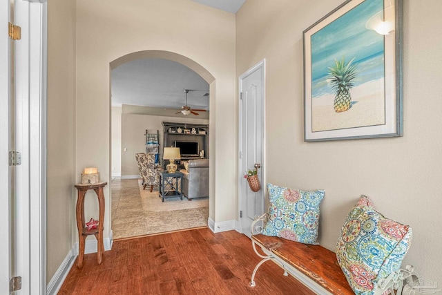 corridor featuring hardwood / wood-style floors