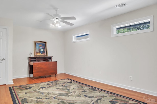 interior space featuring ceiling fan and light hardwood / wood-style flooring