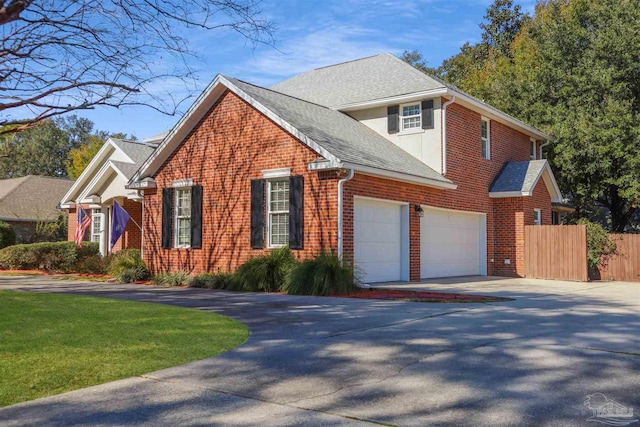 front of property with a garage