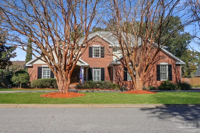 view of front property with a front lawn