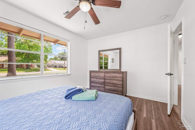 bedroom featuring ceiling fan and hardwood / wood-style flooring