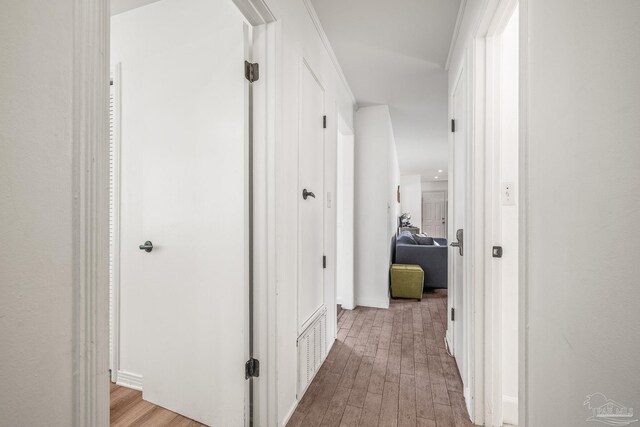 hallway with light wood-type flooring