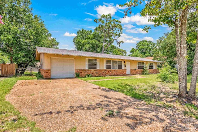 single story home featuring a garage