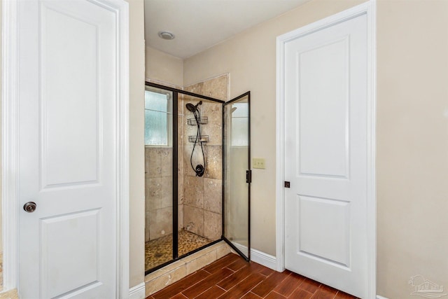 bathroom featuring an enclosed shower