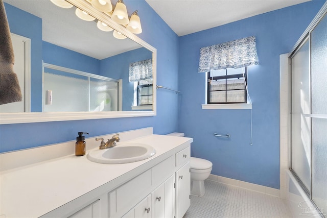 full bathroom with a healthy amount of sunlight, toilet, tile patterned flooring, and combined bath / shower with glass door