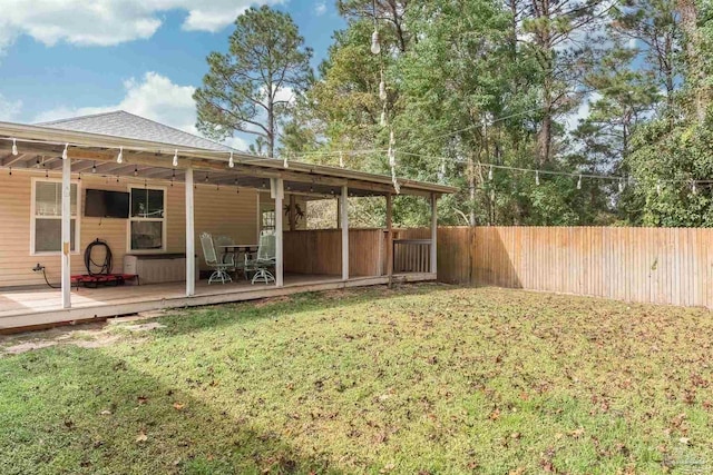 view of yard featuring a deck