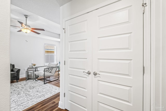 hall featuring dark wood-type flooring