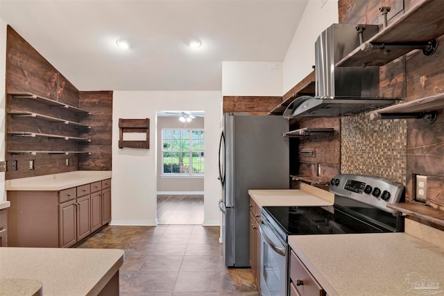 kitchen featuring light tile patterned flooring, ceiling fan, stainless steel appliances, range hood, and backsplash