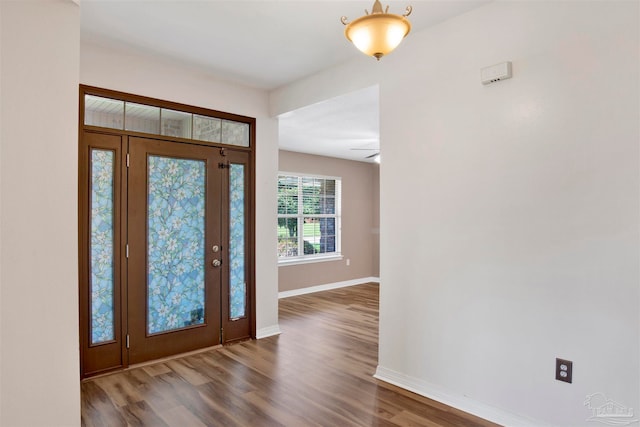 entryway featuring hardwood / wood-style flooring and ceiling fan