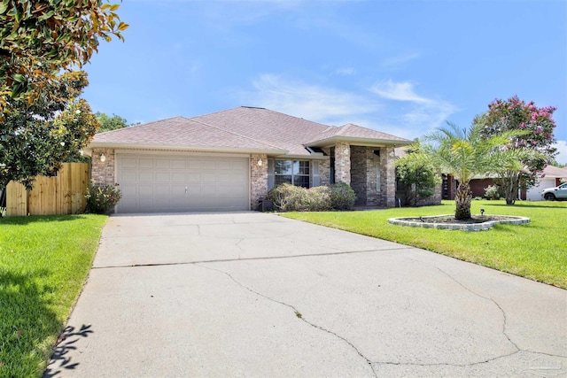 ranch-style house with a front yard and a garage