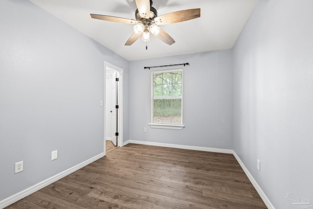 unfurnished room featuring ceiling fan and hardwood / wood-style floors