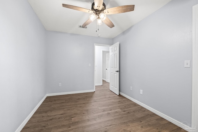 unfurnished room with hardwood / wood-style floors and ceiling fan