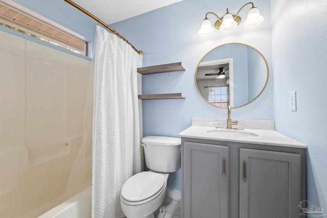 full bathroom with vanity, ceiling fan, toilet, and shower / tub combo with curtain