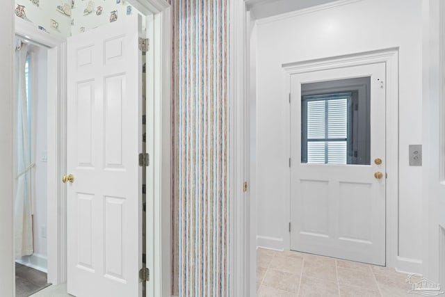 entrance foyer featuring light tile patterned floors